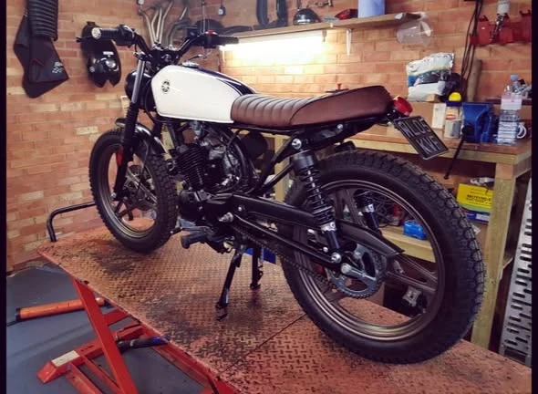 Custom scrambler motorcycle in the workshop